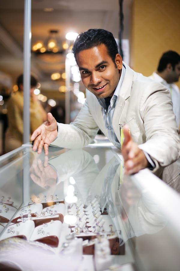 Jewelry seller stock image. Image of expensive, glass 4474871