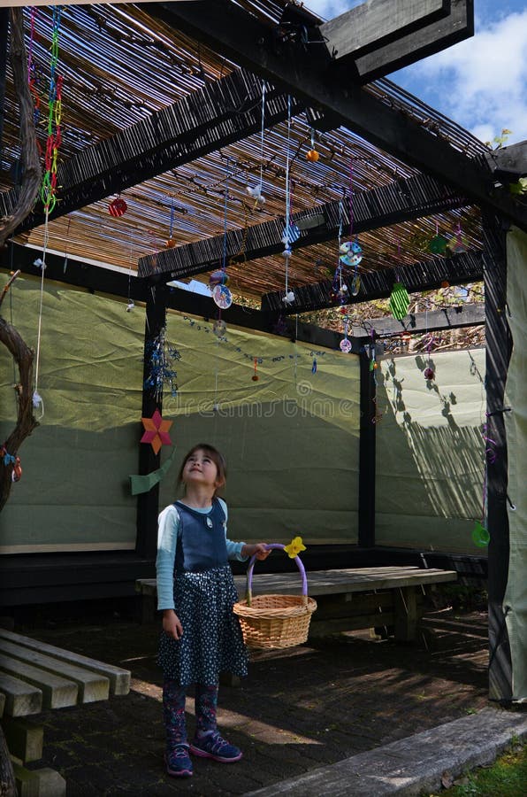 Jewish child decorating the family Sukkah royalty free stock photography Jewish child decorating the family Sukkah royalty free stock photography
