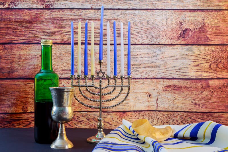 Jewish holiday Hanukkah wine taliit Beautiful menorah. December, chanukiah.