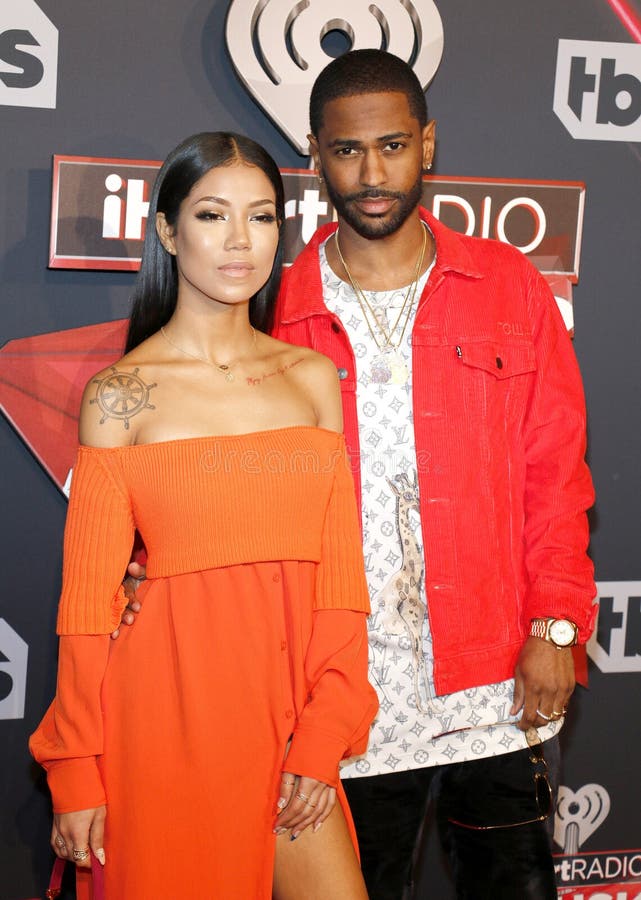 Jhene Aiko en Groot Sean stock foto's