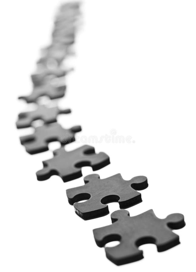 Row Of Jigsaw Puzzle Pieces Stock Photo Image of hobby, puzzle 7317774