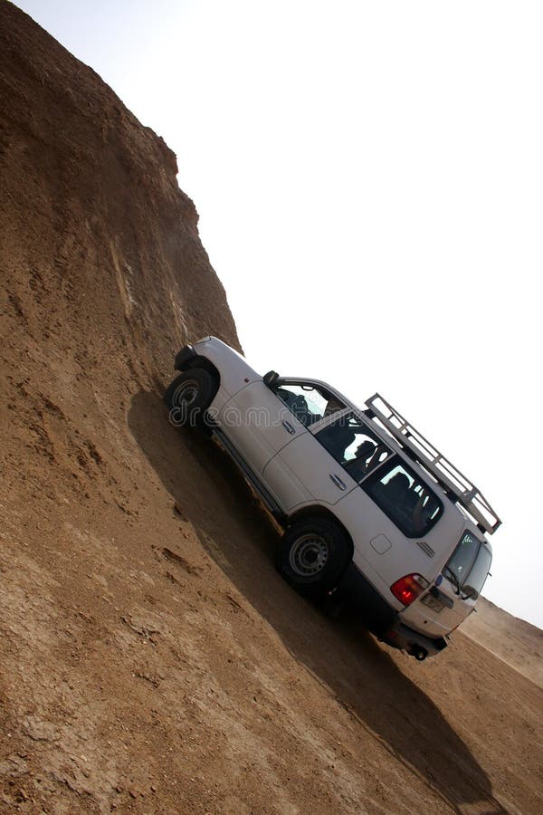 Jeep car in stone desert Tunisia. Jeep car in stone desert Tunisia