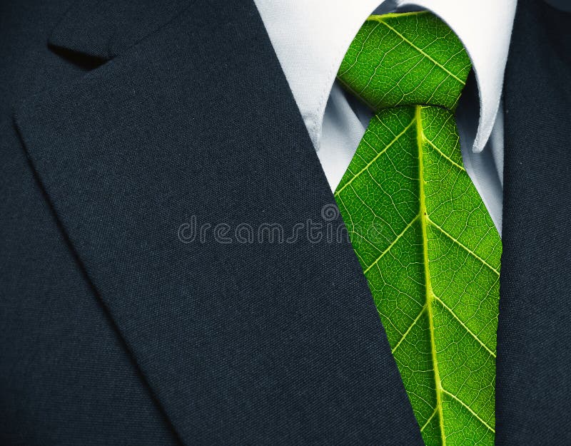 Business suit and green leaves as tie representing a natural job in defence of a green environment. Business suit and green leaves as tie representing a natural job in defence of a green environment.