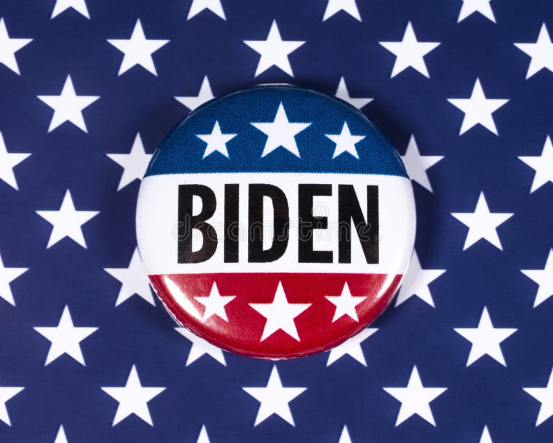 London, UK - February 10th 2020: A Joe Biden pin badge pictured over the USA flag symbolizing his campaign to become the next President of the United States in 2020. London, UK - February 10th 2020: A Joe Biden pin badge pictured over the USA flag symbolizing his campaign to become the next President of the United States in 2020