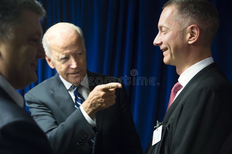 NEW YORK, USA - Sep 29, 2015: President of Ukraine Petro Poroshenko, vice president of USA Joe Biden and the head of Presidential Administration of Ukraine Borys Lozhkyn during a meeting in New York. NEW YORK, USA - Sep 29, 2015: President of Ukraine Petro Poroshenko, vice president of USA Joe Biden and the head of Presidential Administration of Ukraine Borys Lozhkyn during a meeting in New York