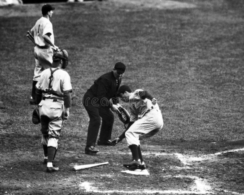 Former New York Yankees great Joe DiMaggio steps on home plate during a game. (Image taken from a black and white negative.). Former New York Yankees great Joe DiMaggio steps on home plate during a game. (Image taken from a black and white negative.)