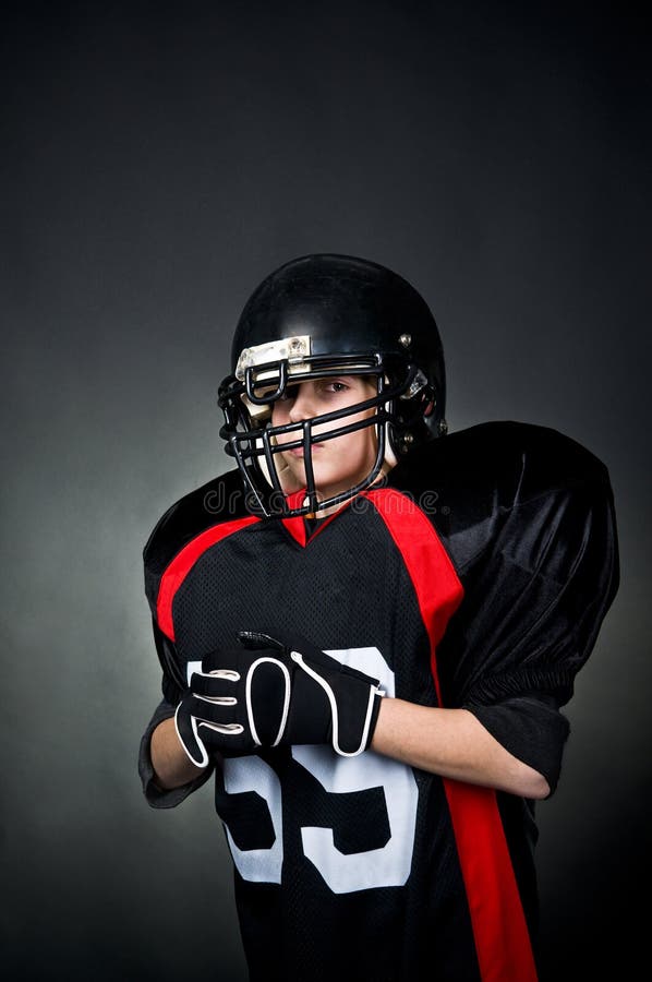 Feminino jogador de futebol americano em uniforme — Fotografias de Stock ©  DmitryPoch #132271496