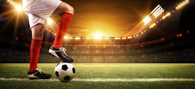 Jogador de futebol no estádio imagem de stock Jogador de futebol no estádio imagem de stock