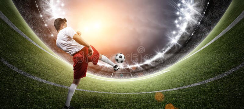Jogador de futebol no estádio foto de stock Jogador de futebol no estádio foto de stock
