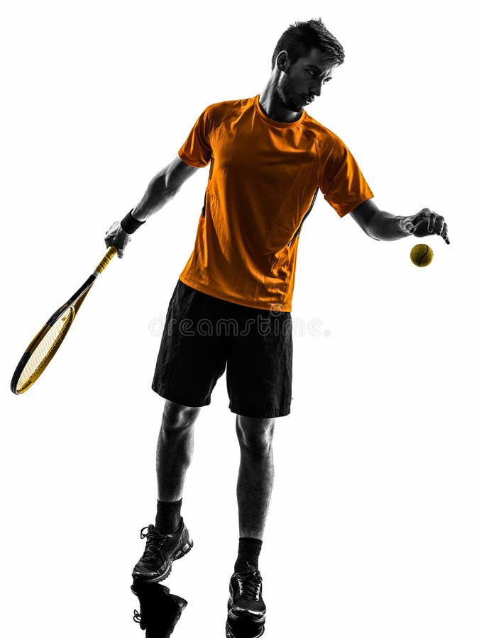 Jogador de tênis do homem na silhueta do serviço do serviço imagens de stock royalty free Jogador de tênis do homem na silhueta do serviço do serviço imagens de stock royalty free