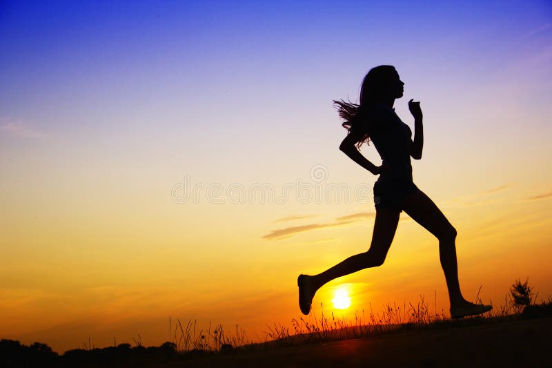 Black silhouette of a jogging woman at sunset. sport. Black silhouette of a jogging woman at sunset. sport