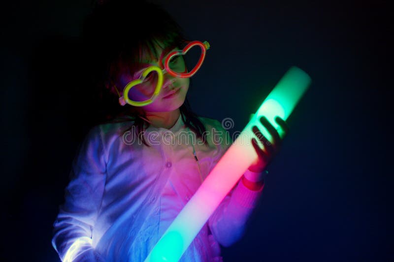 Jogo da menina com luzes coloridas fotos de stock Jogo da menina com luzes coloridas fotos de stock