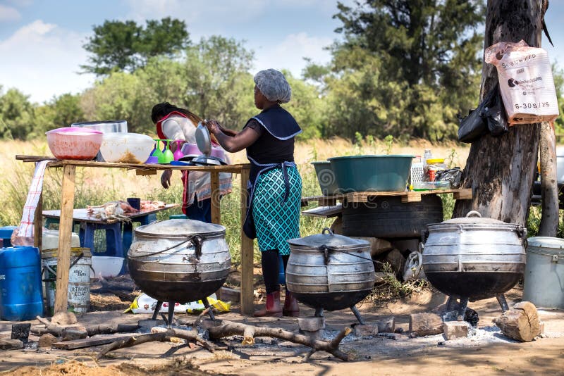Roadside food stall in South Africa. Johannesburg, South Africa - March 6, 2018: Roadside food stall with large cooking pots royalty free stock image Roadside food stall in South Africa. Johannesburg, South Africa - March 6, 2018: Roadside food stall with large cooking pots royalty free stock image
