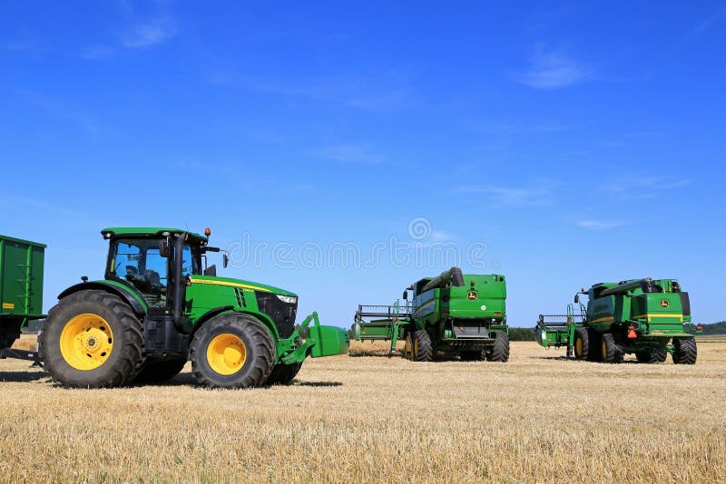 John Deere Agricultural Equipment on Field stock photo John Deere Agricultural Equipment on Field stock photo