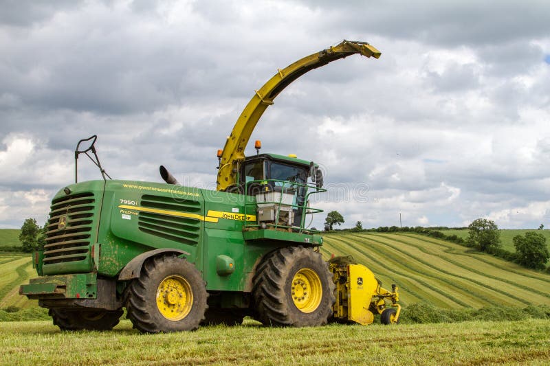 John Deere Forage Harvester with Rows of Grass Editorial Photo Image