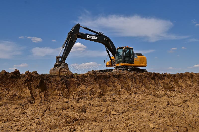 John Deere 250G excavating machine