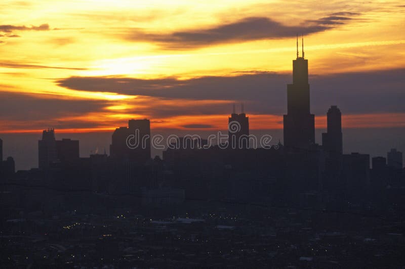 John Hancock Building towers above Chicago Skyline at Sunrise, Chicago, Illinois