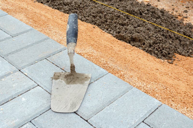 Jointer during concreting stock photo. Image of sand 56053926