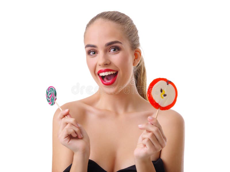 Jong blonde met een lolly in handen Geïsoleerdj op witte achtergrond stock afbeeldingen Jong blonde met een lolly in handen Geïsoleerdj op witte achtergrond stock afbeeldingen