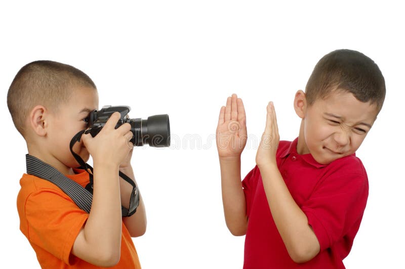 Jong geitje dat een beeld neemt stock foto Jong geitje dat een beeld neemt stock foto