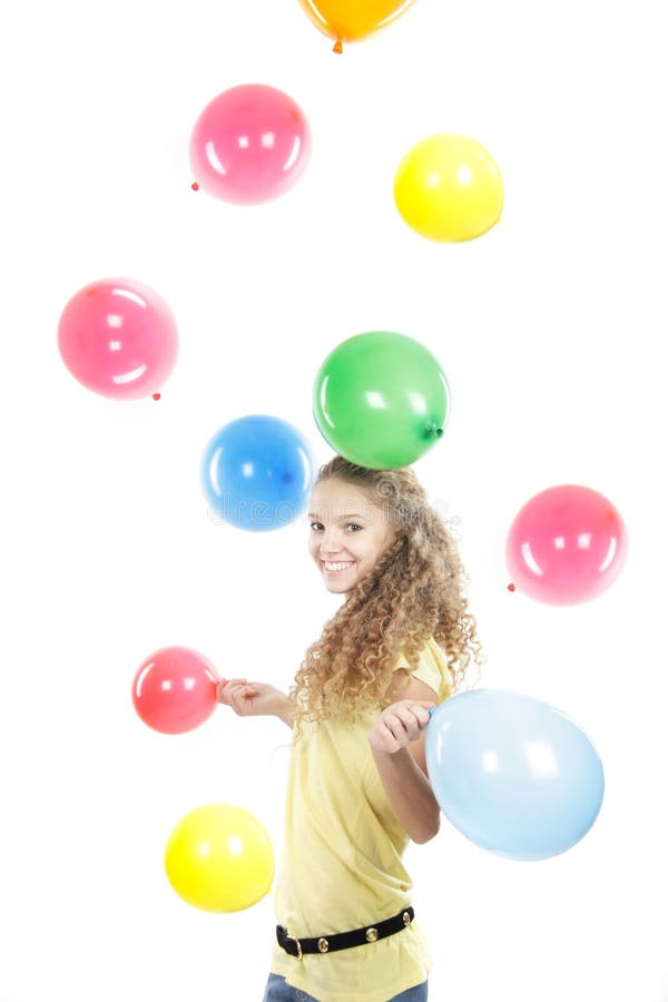 Jong gelukkig meisje met kleurrijke ballons over whit royalty-vrije stock foto Jong gelukkig meisje met kleurrijke ballons over whit royalty-vrije stock foto