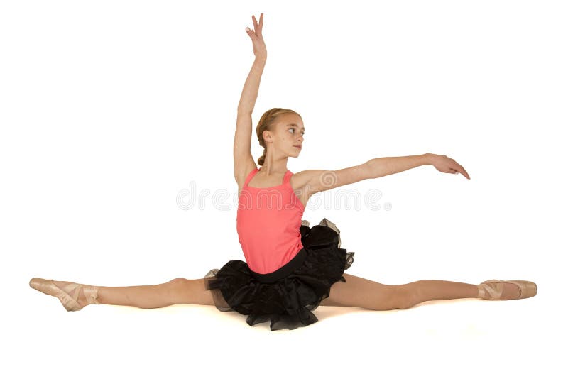 Jonge ballerina in de spleten met omhoog wapens stock fotografie Jonge ballerina in de spleten met omhoog wapens stock fotografie