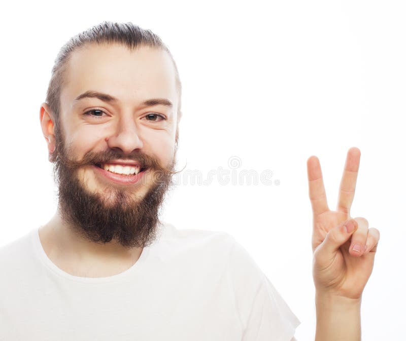 Jonge gebaarde mens met goed ideeteken stock fotografie