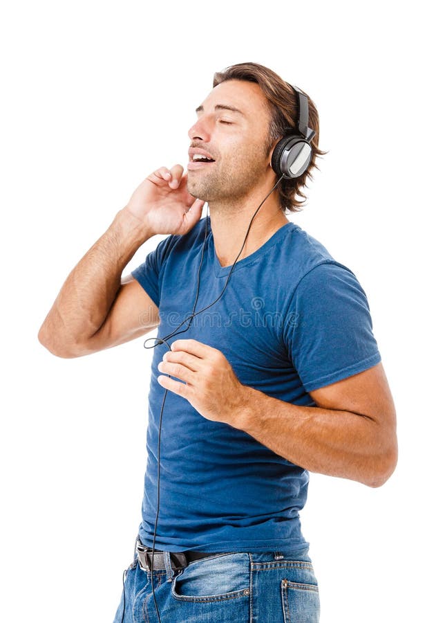 Jonge mens die aan muziek luisteren stock foto's Jonge mens die aan muziek luisteren stock foto's