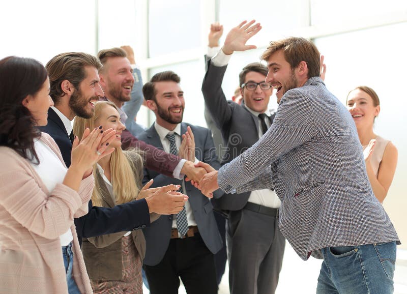 Young business team welcoming their leader . photo with copy space. Young business team welcoming their leader . photo with copy space