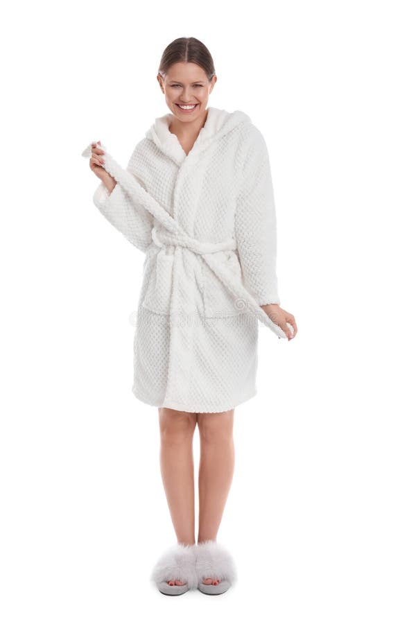 Jonge vrouw in bathrobe op witte achtergrond royalty-vrije stock afbeelding