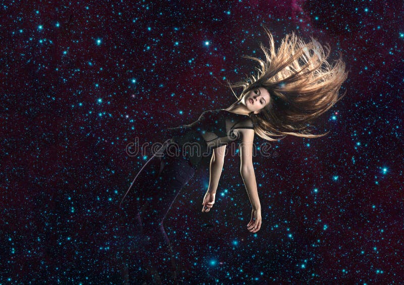 Beautiful, long haired woman falling through stars in space, elements of this image furnished by NASA. Beautiful, long haired woman falling through stars in space, elements of this image furnished by NASA