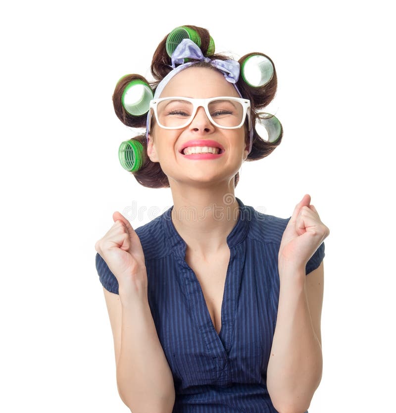 Joyous woman with curlers. Funny girl isolated on white background, studio-shot. Joyous woman with curlers. Funny girl isolated on white background, studio-shot