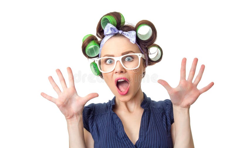 Scared woman with curlers. Funny girl isolated on white background, studio-shot. Scared woman with curlers. Funny girl isolated on white background, studio-shot