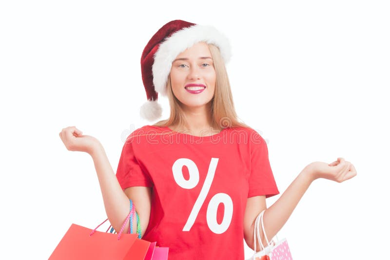 jonge vrouw met santa hoed en het winkelen zakken royalty-vrije stock afbeeldingen jonge vrouw met santa hoed en het winkelen zakken royalty-vrije stock afbeeldingen