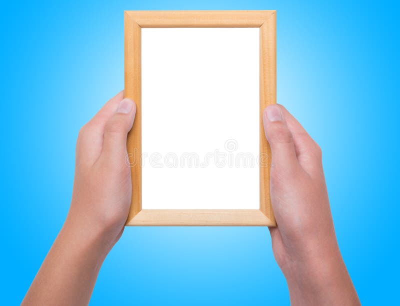 Jonge vrouwelijke handen die fotokader houden royalty-vrije stock afbeelding Jonge vrouwelijke handen die fotokader houden royalty-vrije stock afbeelding