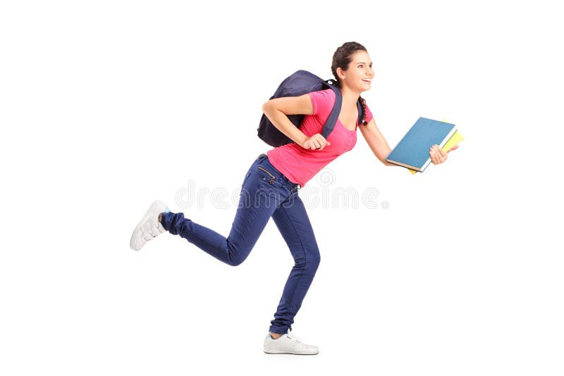 Young female student rushing forwards with book in her hand. Young female student rushing forwards with book in her hand