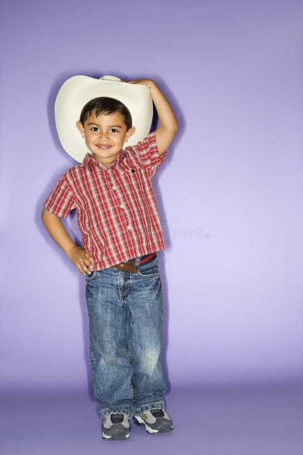 Jongen die cowboyhoed draagt. royalty-vrije stock foto Jongen die cowboyhoed draagt. royalty-vrije stock foto