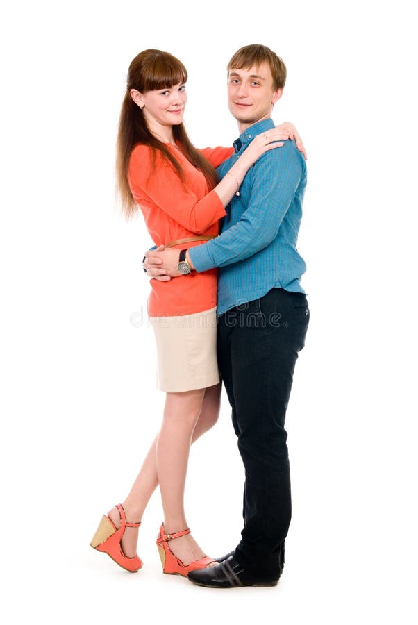 Jongen en meisje in liefde geknuffel in de volledige groei stock afbeelding Jongen en meisje in liefde geknuffel in de volledige groei stock afbeelding
