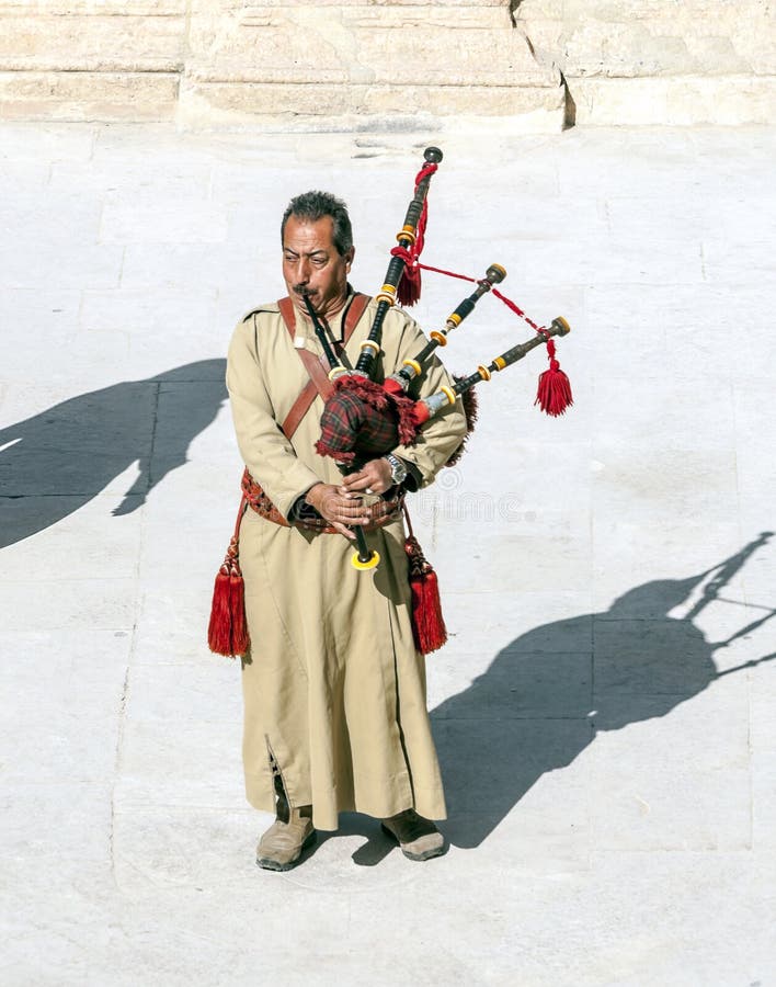Jordanian Man Playing Bagpipes Editorial Photo Image of architecture