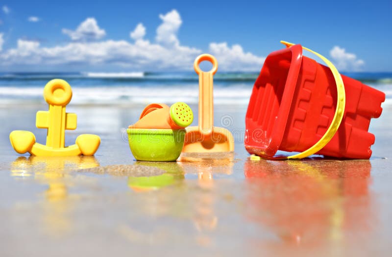 Closeup of children's beach toys at the beach. Closeup of children's beach toys at the beach