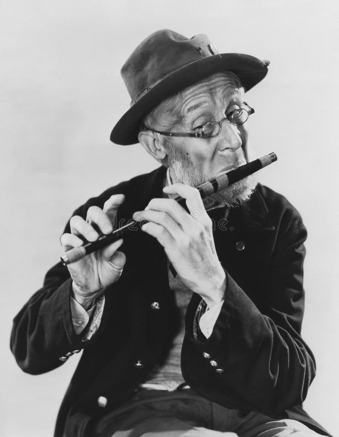 Joueur de pipeau pie photo stock Joueur de pipeau pie photo stock