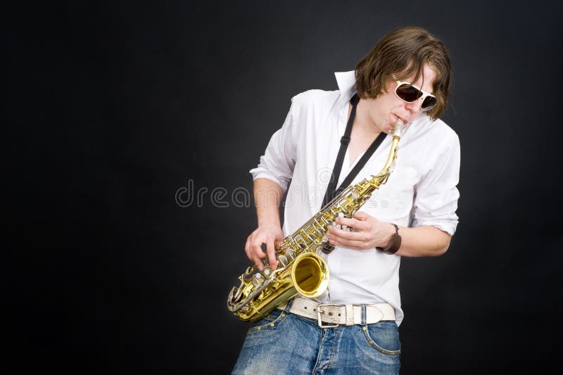 Joueur de saxophone image stock. Image du jazz, roche 13256391