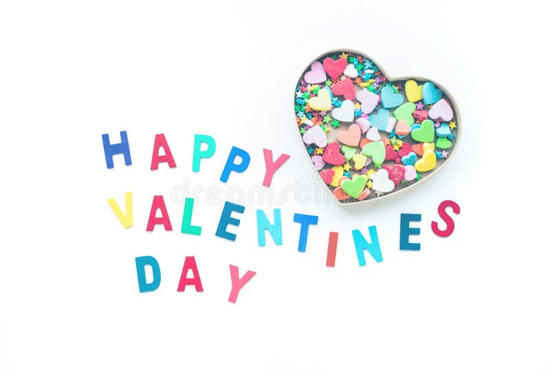 Jour heureux du ` s de valentine avec la forme colorée de coeur dans la boîte