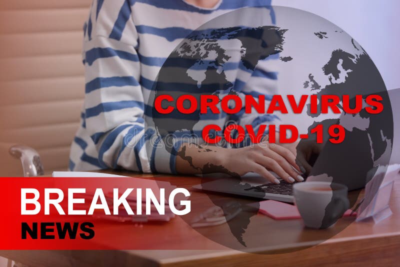 Journalist working with laptop in office. Coronavirus breaking news royalty free stock images