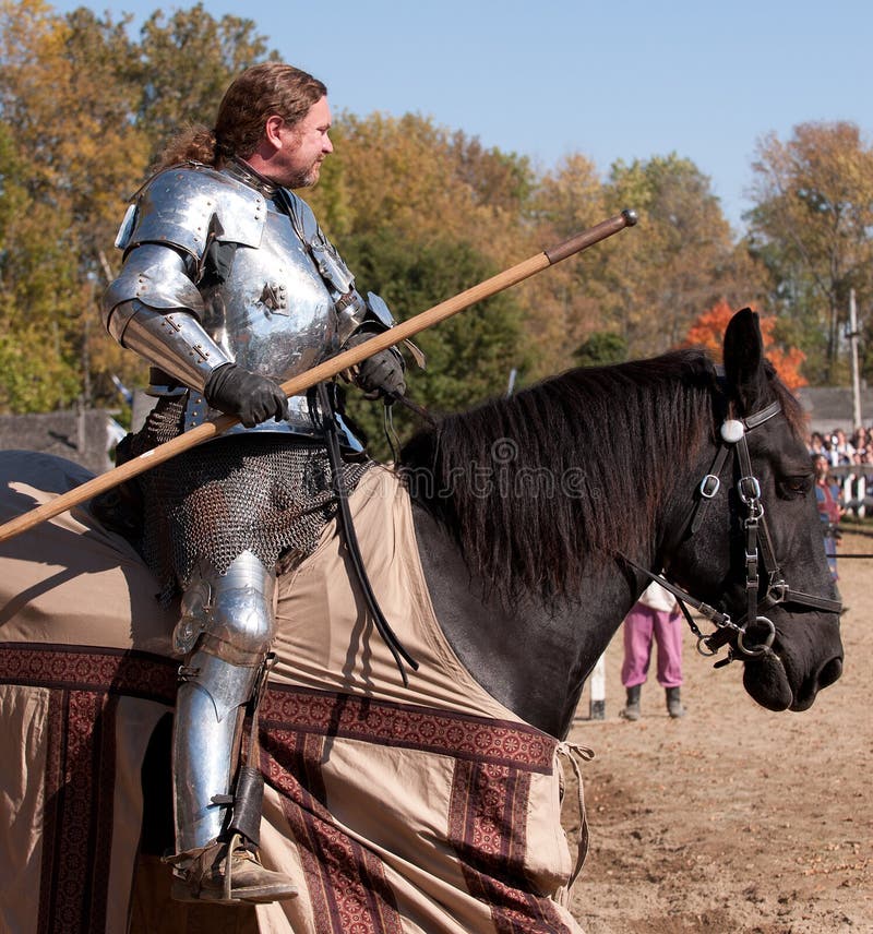 HARVEYSBURG OH,OCTOBER 9 2010- Reigning World Champion full-contact Jouster, Shane Adams waits on horseback for a jousting game to begin at the Ohio Renaissance Festival, October 9, 2010. HARVEYSBURG OH,OCTOBER 9 2010- Reigning World Champion full-contact Jouster, Shane Adams waits on horseback for a jousting game to begin at the Ohio Renaissance Festival, October 9, 2010.