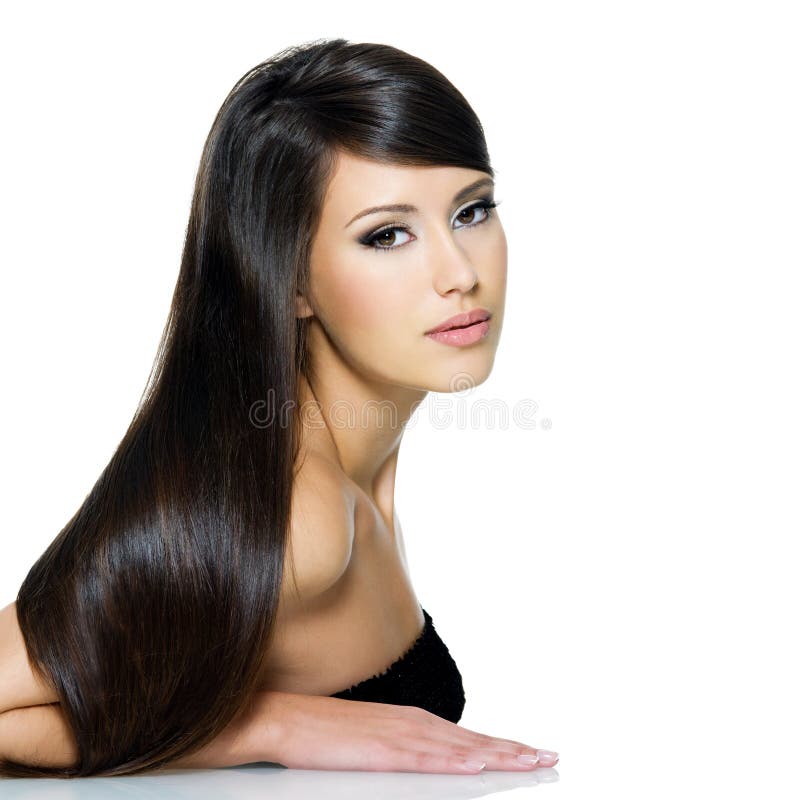 Jovem mulher bonita com cabelo marrom por muito tempo reto imagem de stock Jovem mulher bonita com cabelo marrom por muito tempo reto imagem de stock