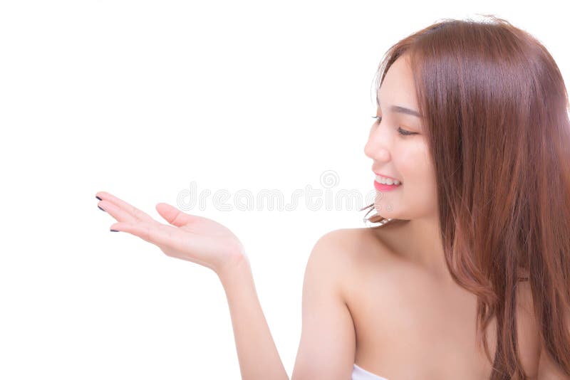 A jovem mulher bonita de encantamento olha espaço à mão ou da cópia Attr fotografia de stock royalty free A jovem mulher bonita de encantamento olha espaço à mão ou da cópia Attr fotografia de stock royalty free