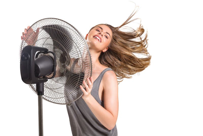 Jovem mulher com fã mais fresco imagem de stock Jovem mulher com fã mais fresco imagem de stock