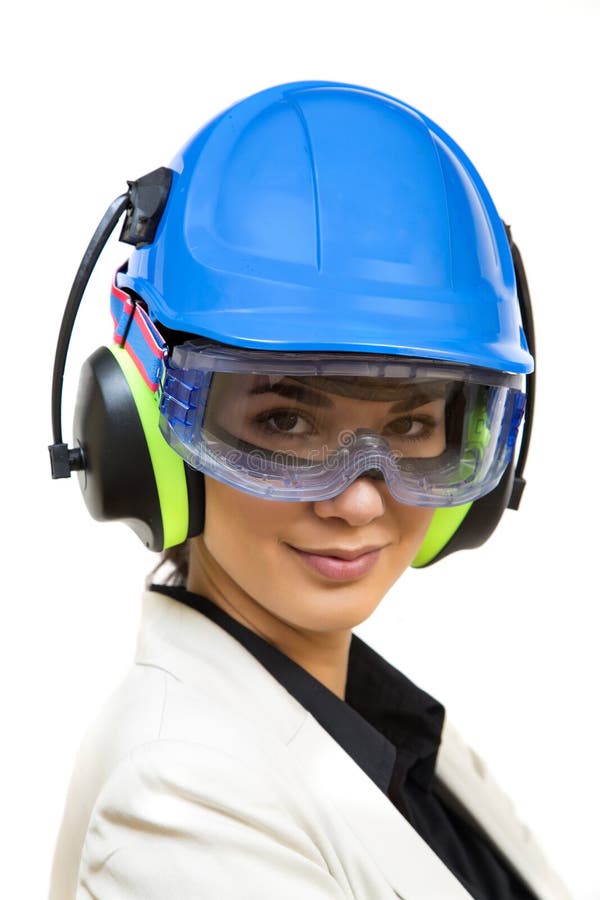 Jovem mulher no workwear protetor foto de stock Jovem mulher no workwear protetor foto de stock