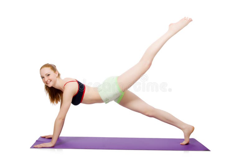 Jovem mulher que faz os exercícios do esporte isolados foto de stock royalty free Jovem mulher que faz os exercícios do esporte isolados foto de stock royalty free